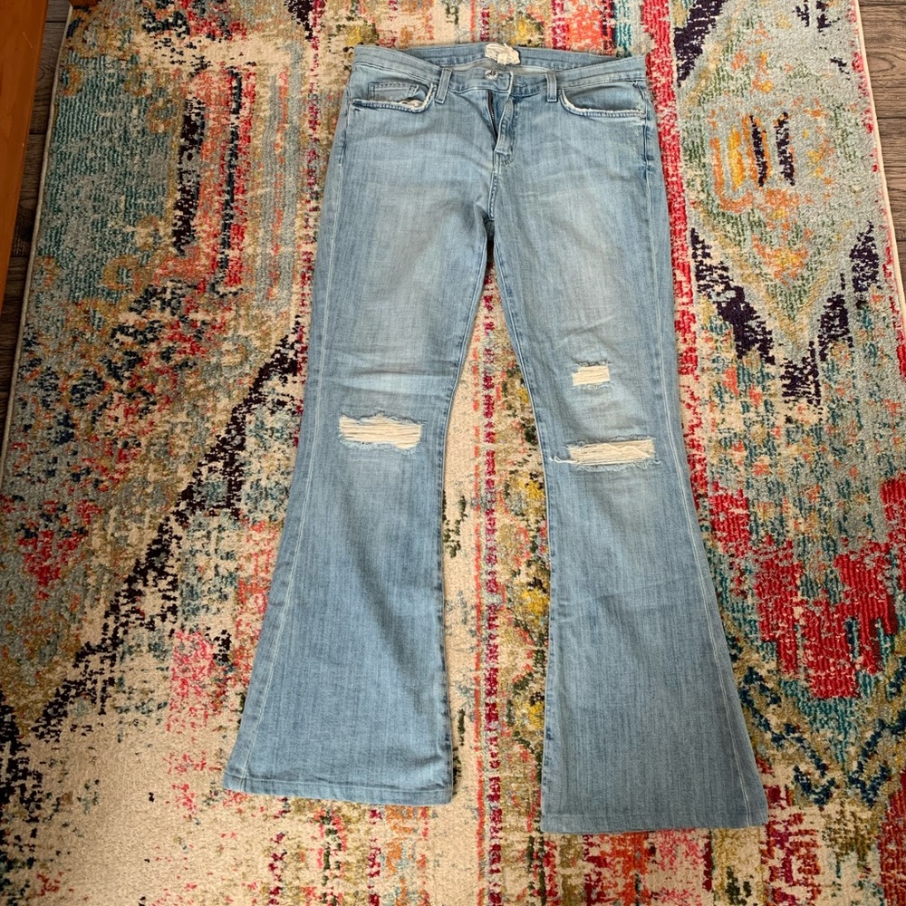 Ripped knee flare jeans